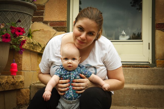 Sonja at eight months, plus bonus Misha photobomb!